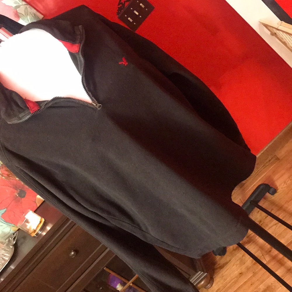 American Eagle brown pull over.